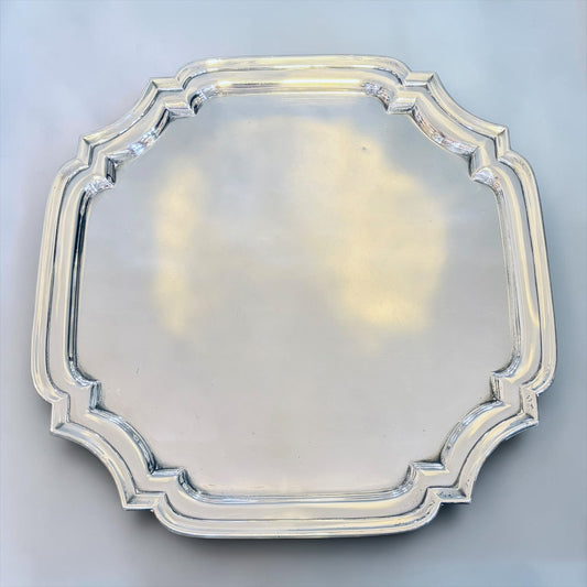 KLS Vaults 1937 sterling silver square salver with a Chippendale border and polished finish.