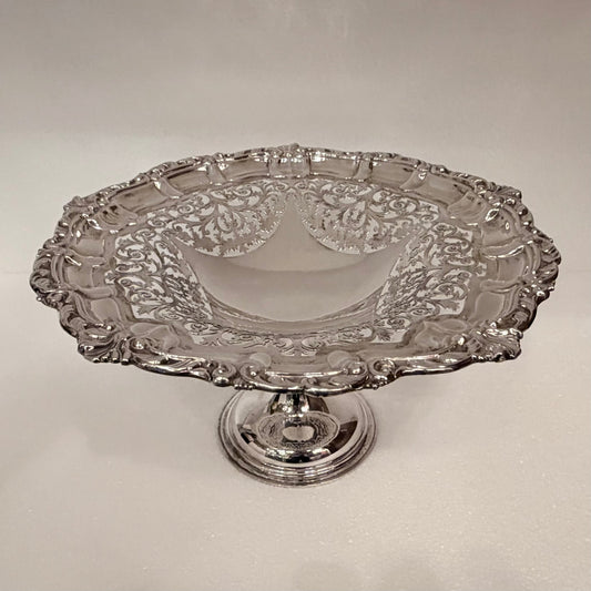KLS Vaults 1913 sterling silver tazza with ornate pierced foliate bowl, shell rim, and pedestal base.