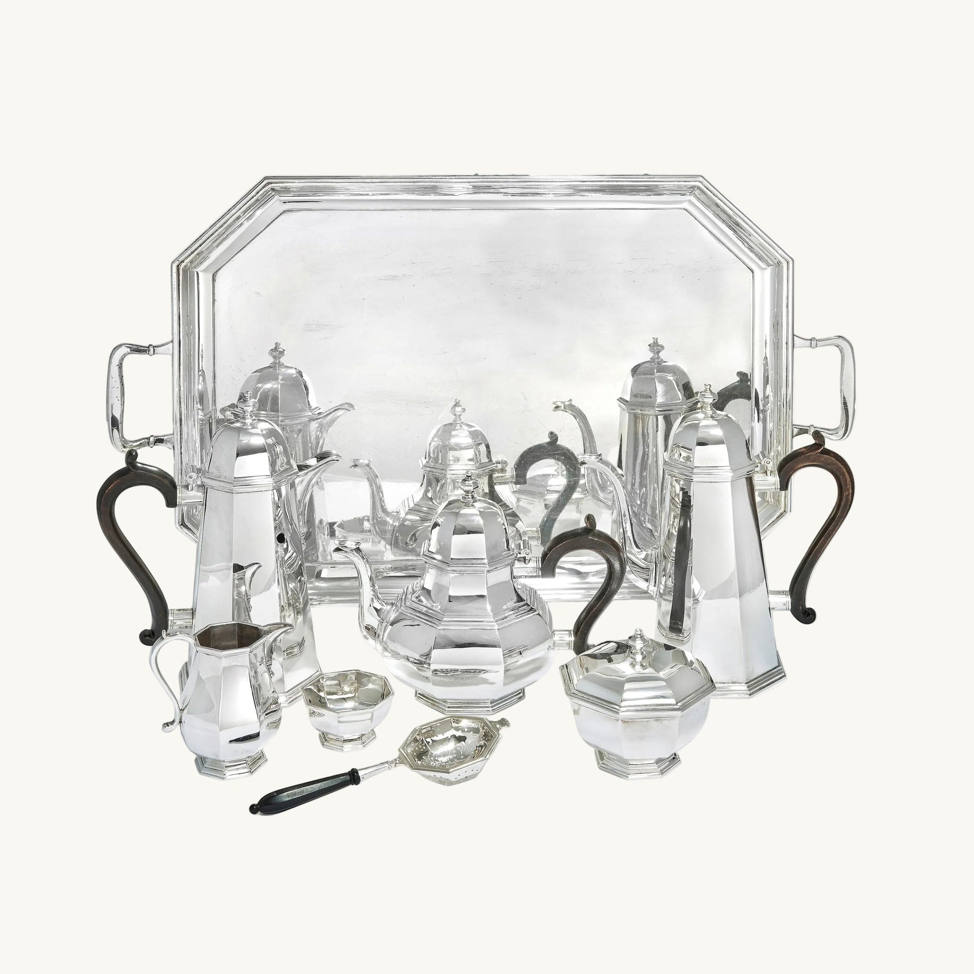 KLS Vaults sterling silver seven-piece tea and coffee service with octagonal design and ebonised wood handles.