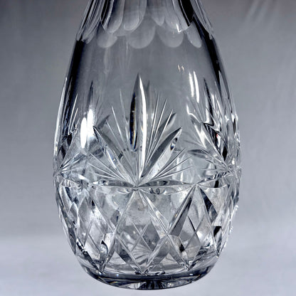 KLS Vaults large teardrop lead crystal decanter with deep-cut geometric patterns and silver mount from 1970
