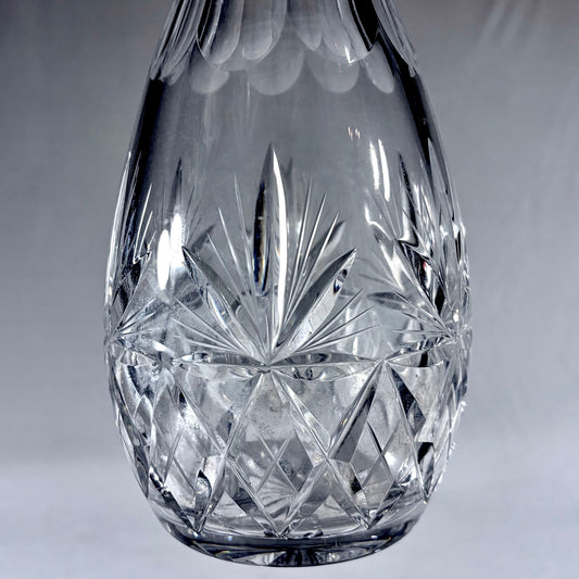 KLS Vaults large teardrop lead crystal decanter with deep-cut geometric patterns and silver mount from 1970