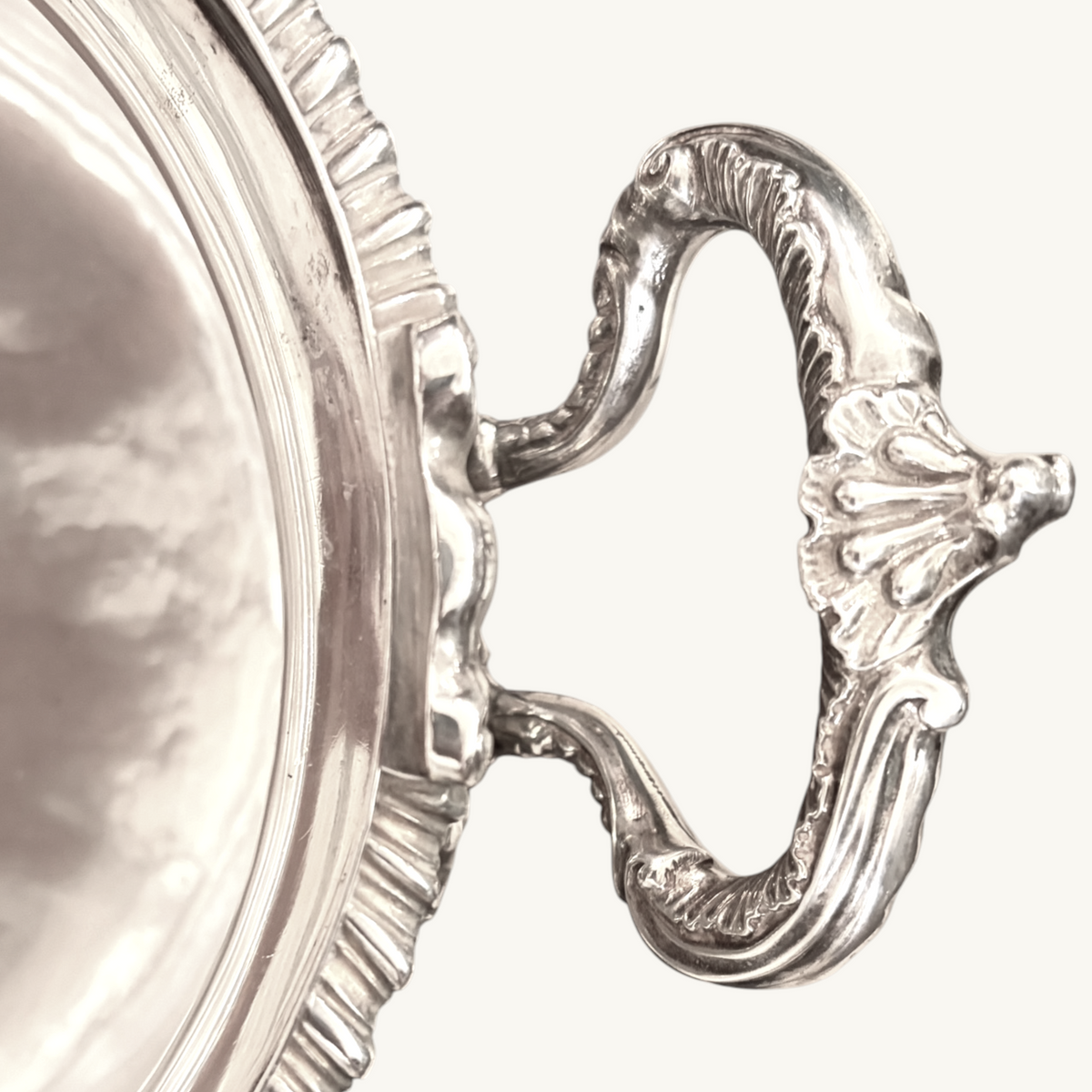KLS Vaults Victorian silver soup tureen handle featuring intricate leaf-capped scrollwork and rocaille acanthus mounts.