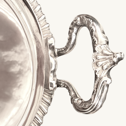 KLS Vaults Victorian silver soup tureen handle featuring intricate leaf-capped scrollwork and rocaille acanthus mounts.