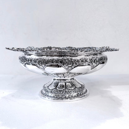 KLS Vaults 1898 Victorian sterling silver centerpiece bowl with intricate repoussé floral and acanthus leaf motifs.